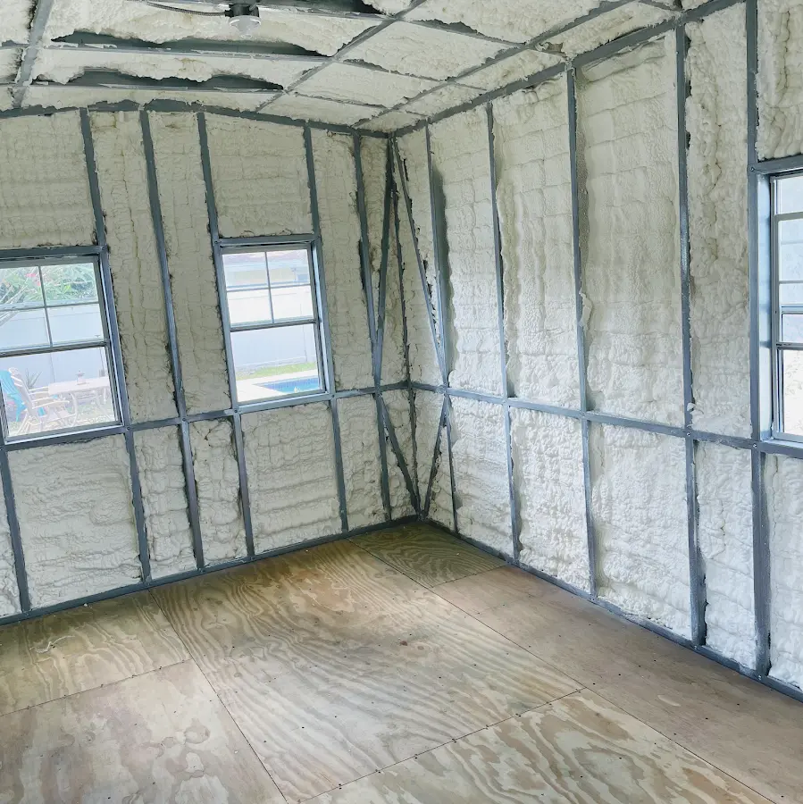 Closed-cell spray foam insulation applied to wall cavities in a residential project in Fairlawn